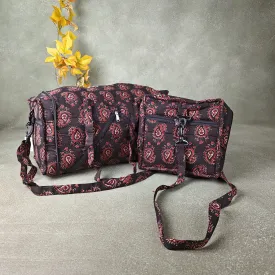 Expandable Travel Bag Black Colour with Red Mango Flower Printed Design.