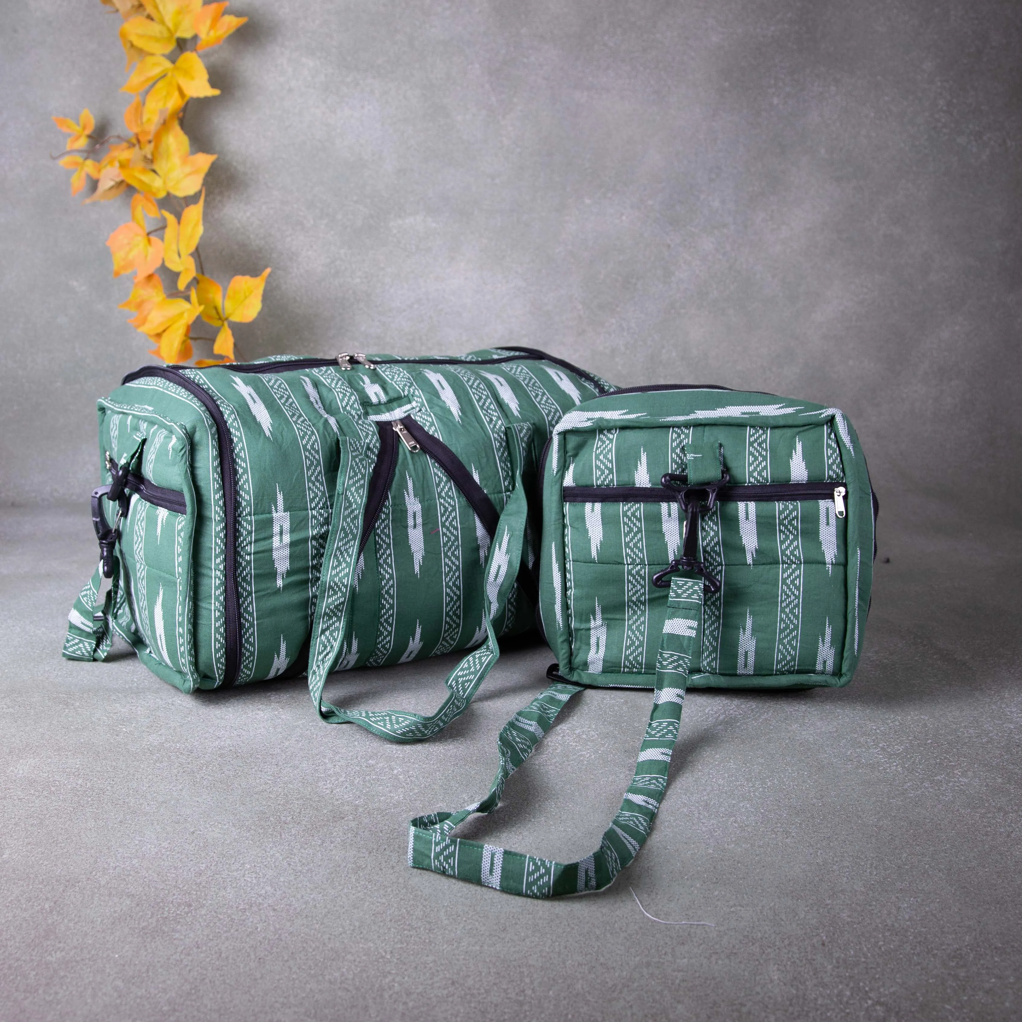 Expandable Travel Bag Dark Green Colour with White Symmetrical Design.